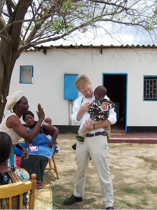 Mitchell Warren visiting an HIV vaccine trial site in Kigail, Rwanda, in 2003