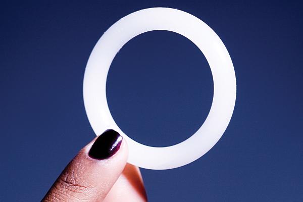 female hand holding up a dapivirine ring